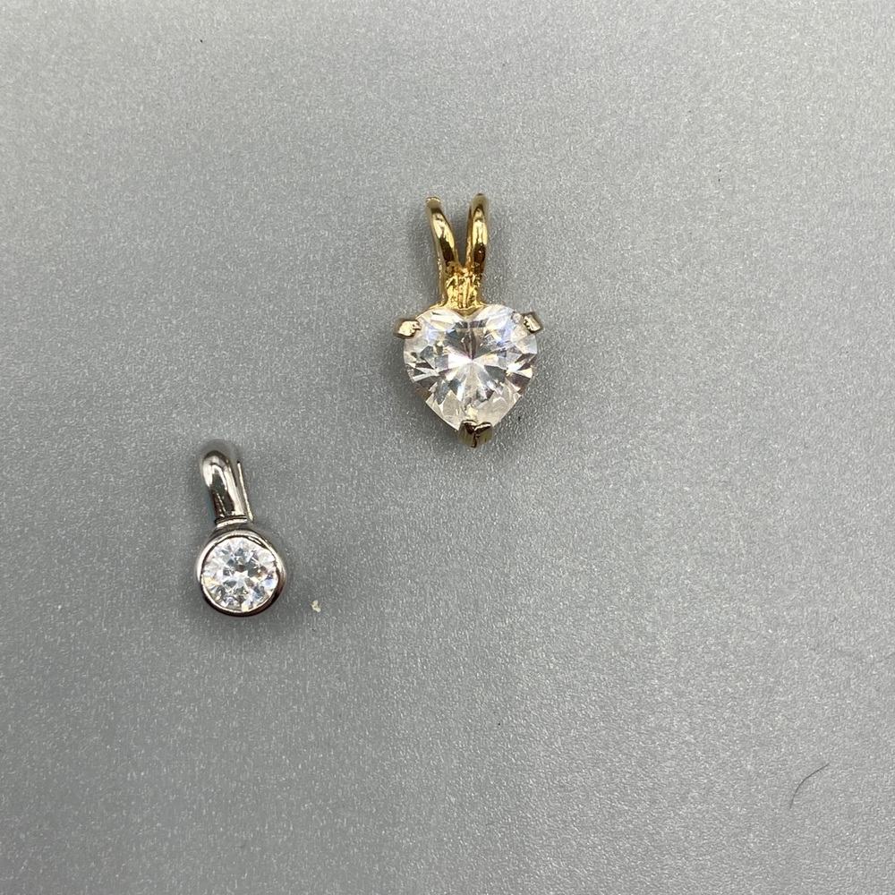 Two cubic zirconia in sterling pendants